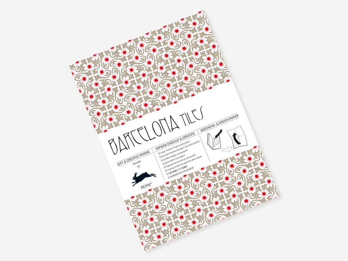 Packaging of Batalerofia tiles with floral patterns on a white background
