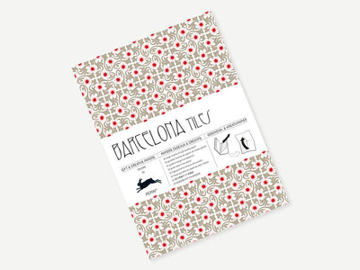 Packaging of Batalerofia tiles with floral patterns on a white background