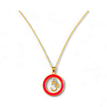 gold chain with pink pendant