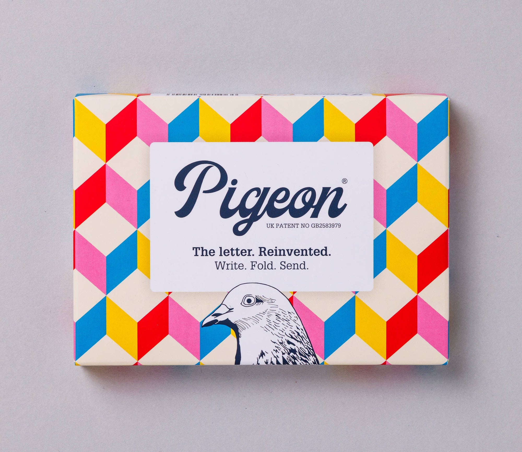 Colorful box with geometric pattern and 'Pigeon' branding on a gray background